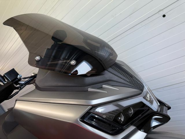 sym - adx-300