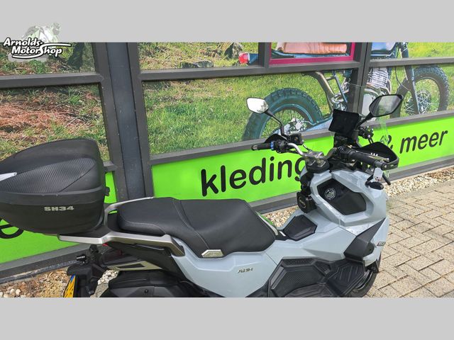 sym - adx-125