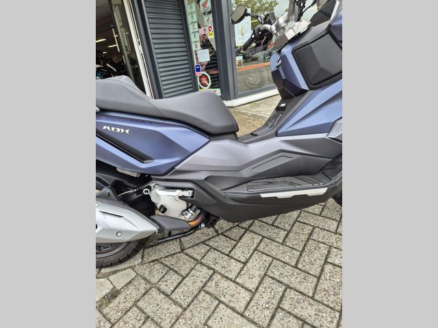 sym - adx-300