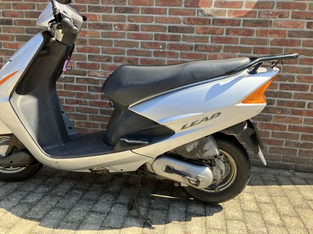 honda - scv-100-lead