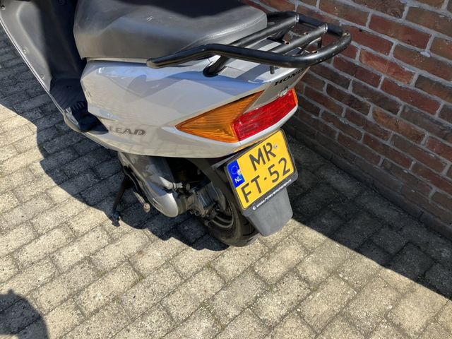 honda - scv-100-lead